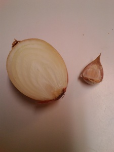 I cut up half an onion and a clove of garlic and sautéed them in a bit of oil.